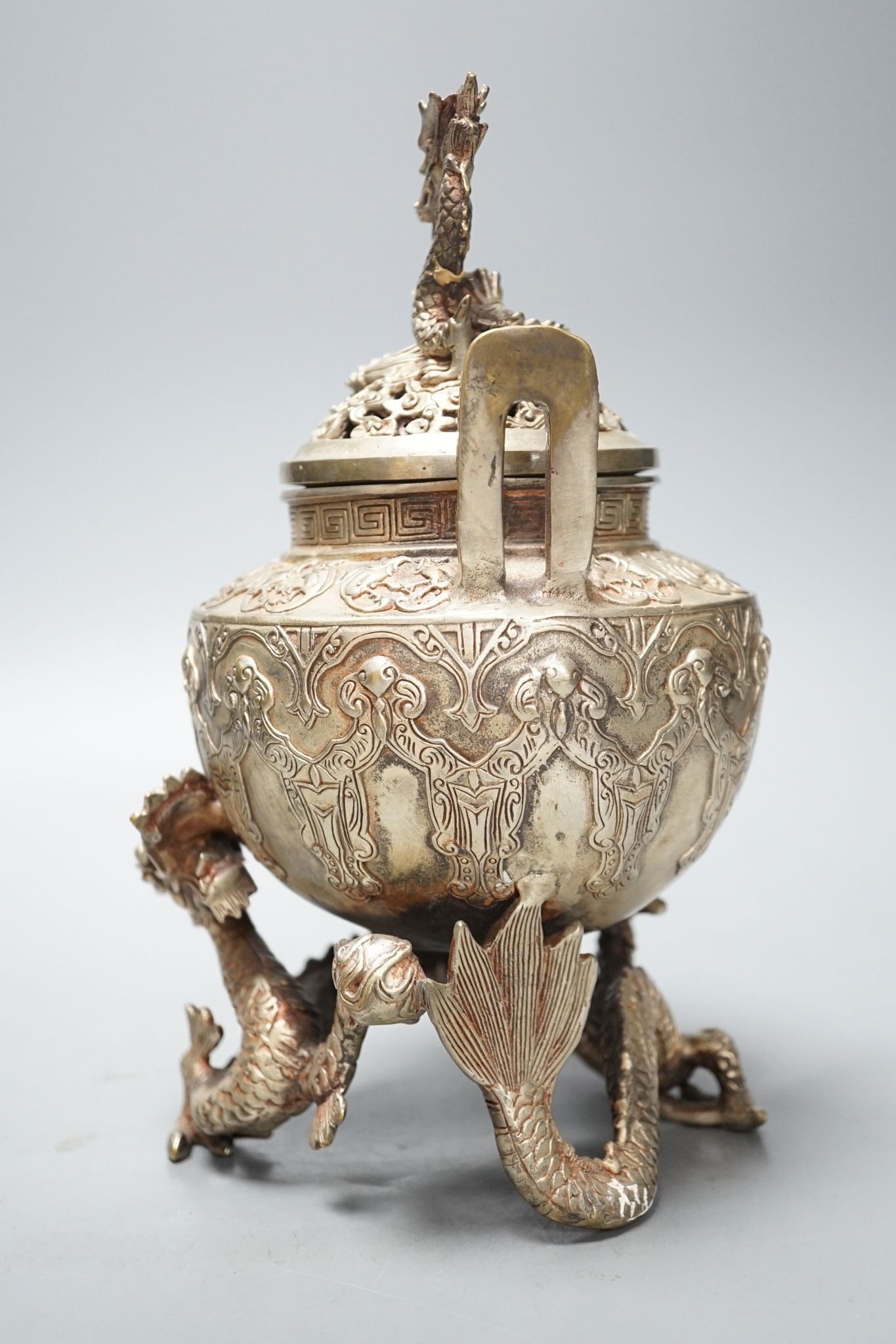 A Chinese bronze 'dragon' censer and cover, 24.5 cms high